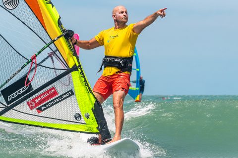 Get and keep upwind in the waves by going upwind, out of the straps, along the wave.